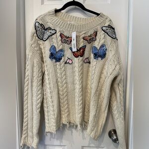 Sunset and Spring woman’s sweater